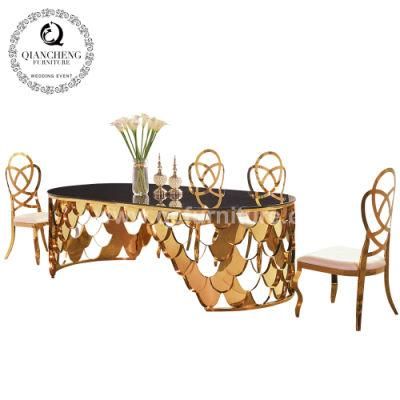 Golden Frame Black Mirrored Glass Top Oval Dining Table Set Designs