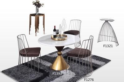 High-End Dining Table with Round Marble Countertops and Stainless Steel Base