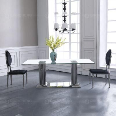 Low Price Nordic Tempered Glass and Silver Dining Table Set