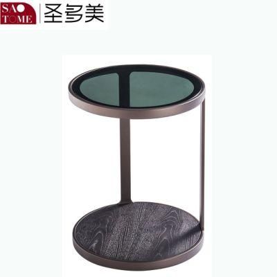 Small Round Table with Gray Glass Surface on Wooden Coffee Table