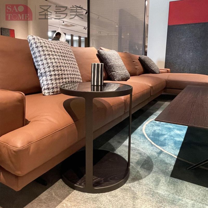 Small Round Table with Gray Glass Surface on Wooden Coffee Table