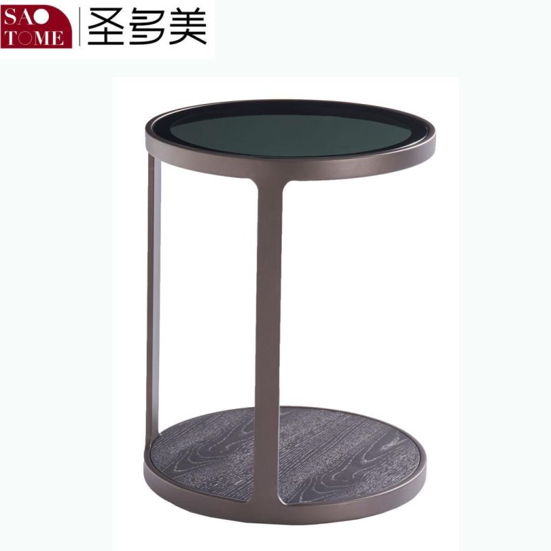 Small Round Table with Gray Glass Surface on Wooden Coffee Table